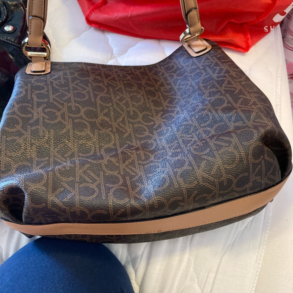 Calvin Klein brown and tan shoulder bag with multiple compartments